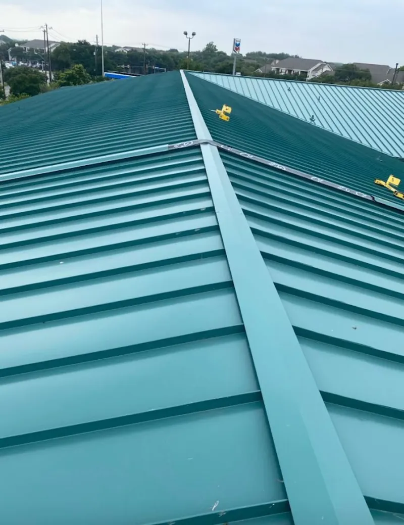 Green commercial metal roof ridge and valley for Metal Roof Repair in Moorefield